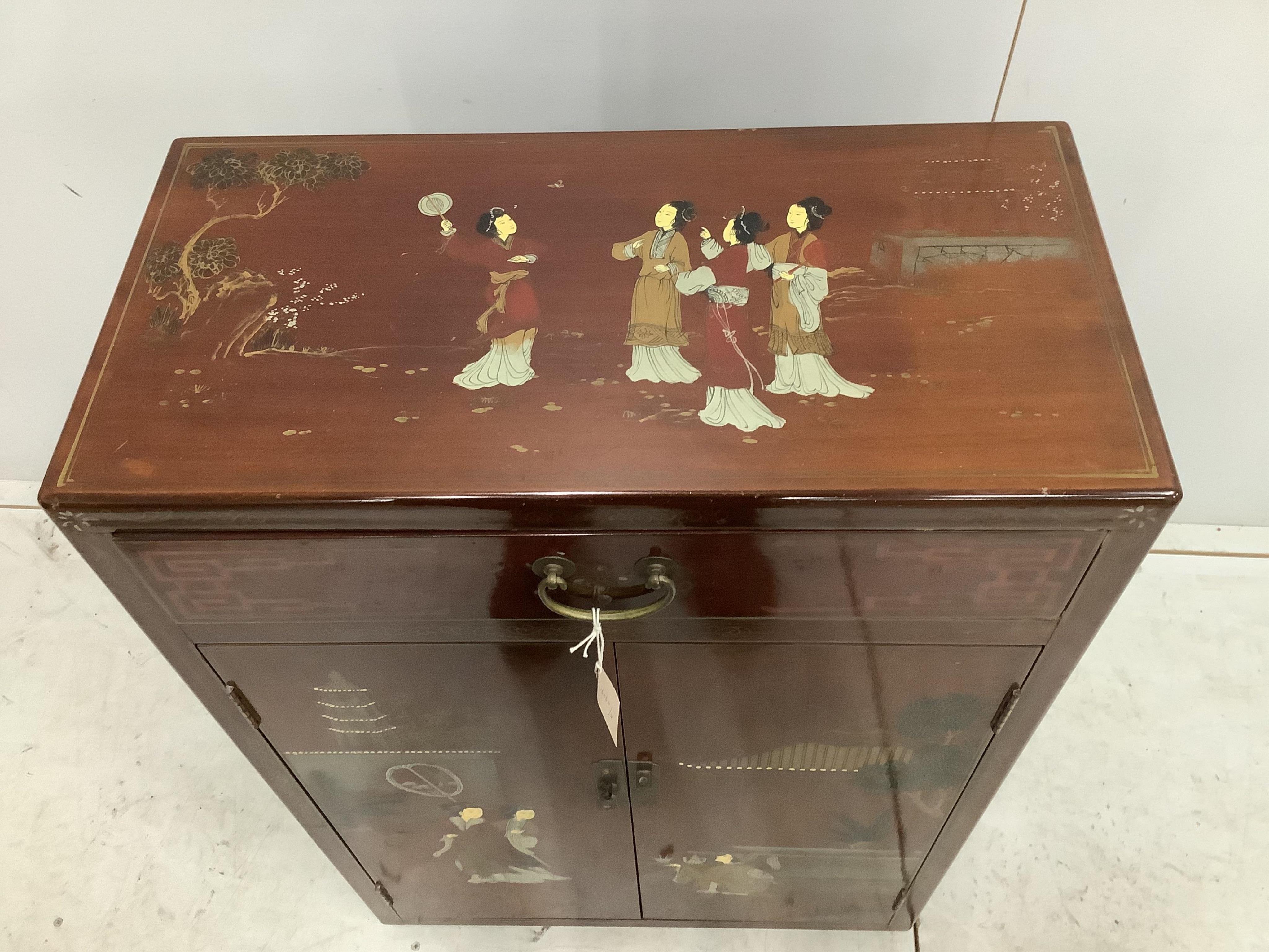 A Chinese painted hardwood side cabinet, width 60cm, depth 30cm, height 91cm. Condition - good